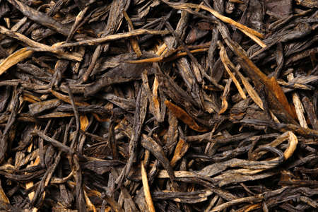 Dian Hong Jin Zhen. Red tea, golden needles on white background. top view. close up. high resolutionの写真素材