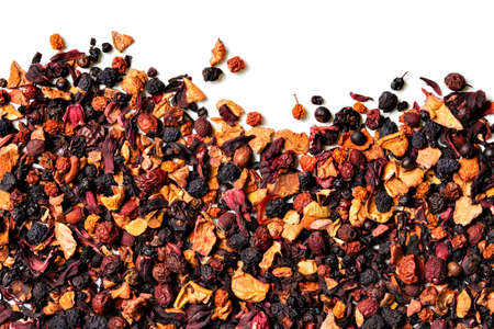 Mix of fruit pieces, berries and Sudanese rose petals(karkade) on white background. top view. close up. high resolutionの写真素材