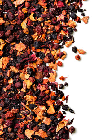 Mix of fruit pieces, berries and Sudanese rose petals(karkade) on white background. top view. close up. high resolutionの写真素材