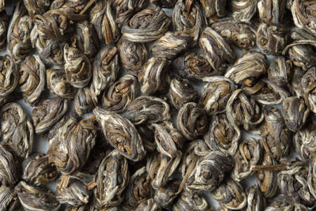 Eye of the Phoenix. Elite Green tea Feng Yan isolated on white background. top view. close up. high resolutionの写真素材
