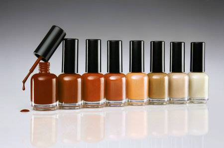 Bottles of nail polish on gray background. close upの写真素材