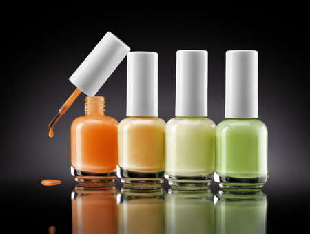 Bottles of gel nail polish on black background. close upの写真素材