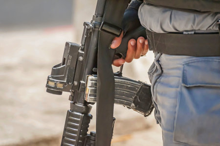 JERUSALEM, ISRAEL. June 20, 2017. Armed with an M-16 Israel border police officer on guard at the...