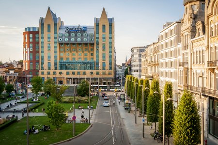 ANTWERP, BELGIUM. July 18, 2017. Antwerp central station square with bus stops and Radisson Blu hotel on the background.のeditorial素材