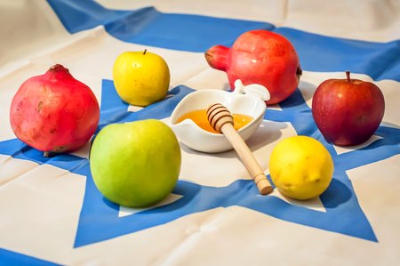 The Jewish New Year Rosh Hashanah concept image. A composition of traditional Jewish symbols associated with this holiday.の写真素材