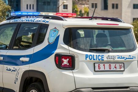 RAMALLAH, PALESTINE. August 31, 2019. Palestinian traffic police car in the downtown Ramallah. Palestinian security force concept image.のeditorial素材