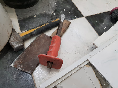 Repair building with tools and hammer, chisel, cleaver and tape measure on the floor