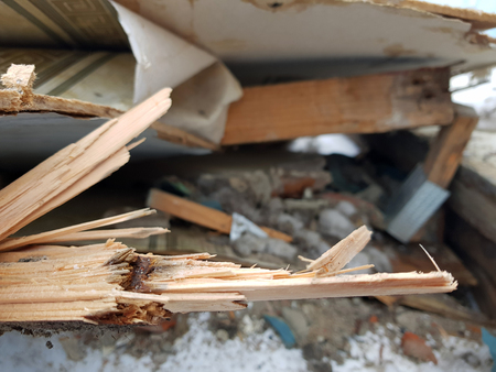 old boards in a pile of construction waste after repairの写真素材