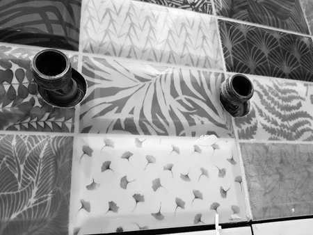 Repair and plumbing - threaded pipe for a water tap on a tile