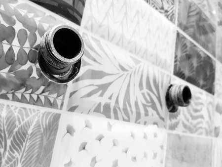 Repair and plumbing - threaded pipe for a water tap on a tile