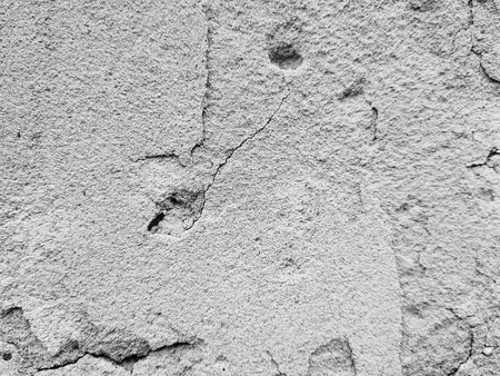 Very beautiful gradient background banner for text - unusual and beautiful texture of plaster or concrete wall with cracks.の写真素材