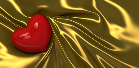 Red heart on gold fabric on Valentineの写真素材