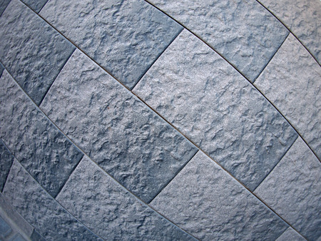 Fragment of grey decorative wall with wide angle fisheye lens viewの写真素材