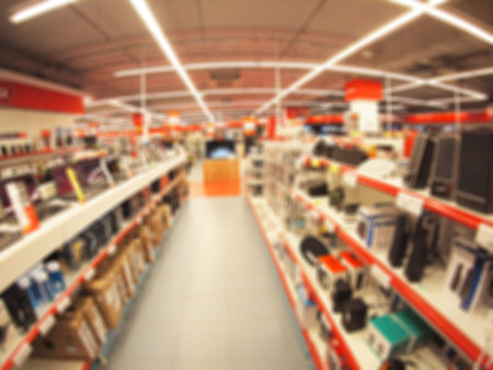 Defocused and blurry image of the store computer equipment and accessories with wide angle fisheye...