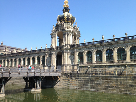 Dresden, Germany - April 23, 2015: View on the moat and an outer wall Zwinger, with tourists who go across the bridgeのeditorial素材