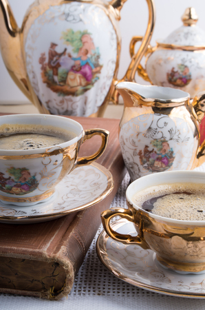 Antique porcelain coffee cups with hot espresso and tableware from the 19th century German Bavariaの写真素材