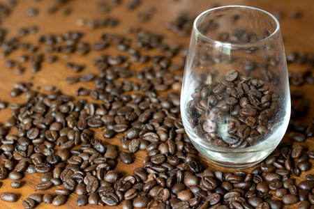 Coffee beans in clear glassの写真素材