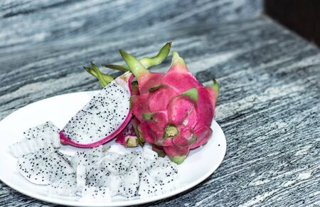 Dragon fruit in white plateの写真素材