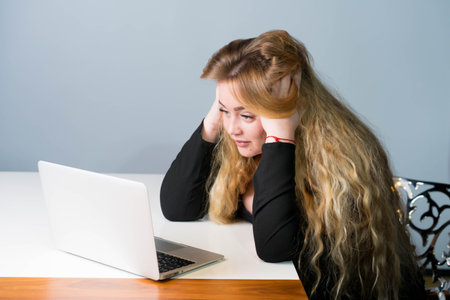 Businesswoman in office laptop computer