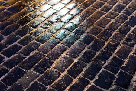 Closeup of block pavement in the darkness (as a background)の写真素材