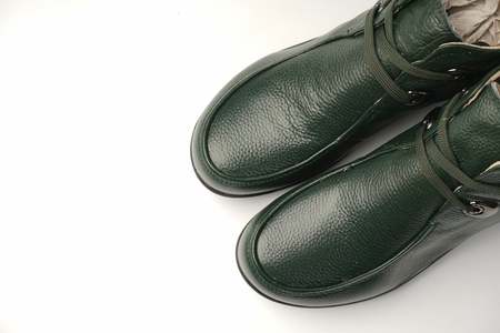 Green shoes on a white backgroundの写真素材