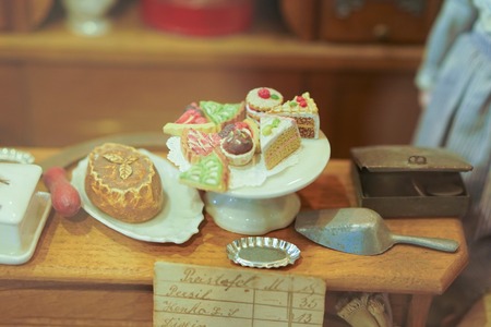 Grandmother's Old Dolls Kitchen with accessories. Toys for girls from the 40s or 50s.の写真素材