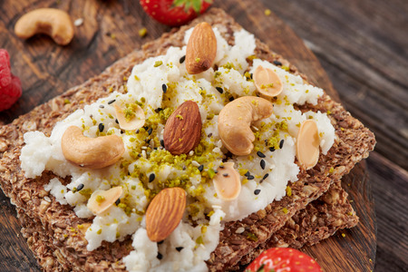 Sandwich with nuts and berrie Useful breakfast.の写真素材