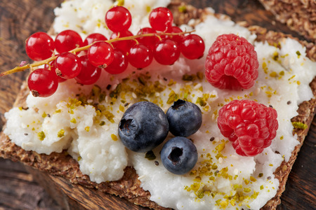 Sandwich with nuts and berrie Useful breakfast.の写真素材
