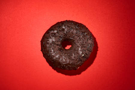Sweet donuts on red backgroundの写真素材