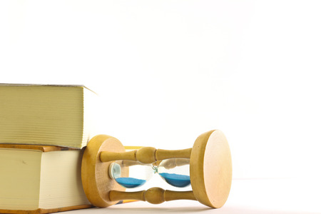 hourglass with bookの写真素材