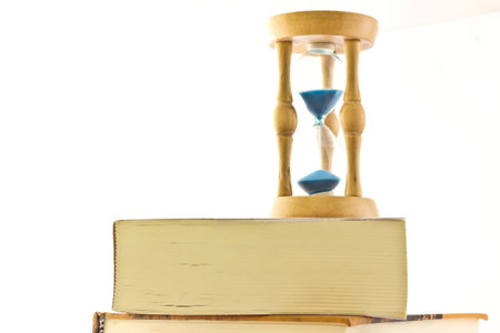 hourglass with book