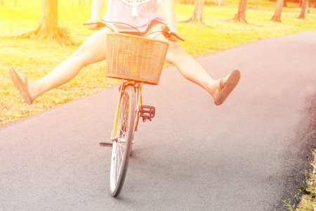 Woman Happy Funny riding bicycleの写真素材