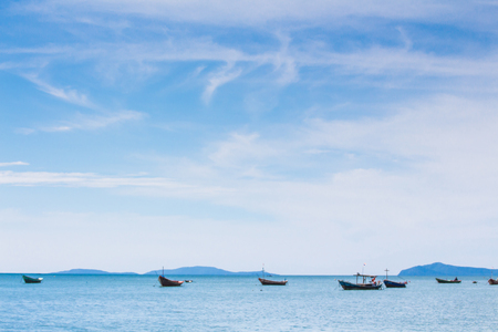 Many ships in the sea with blue skyの写真素材