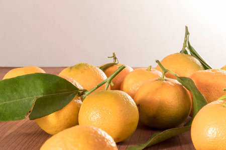 Fresh clementine on wood brown rustic tableの写真素材