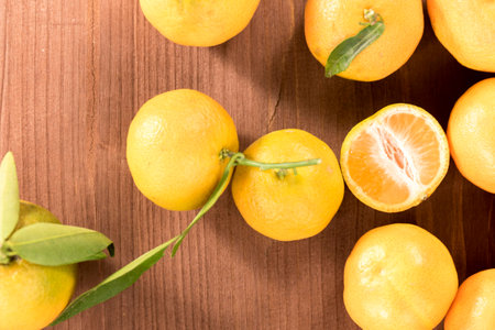 Fresh clementine on wood brown rustic tableの写真素材