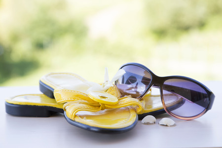sunglasses and slippers, summer conceptの写真素材