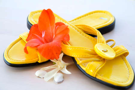 yellow summer slippersの写真素材
