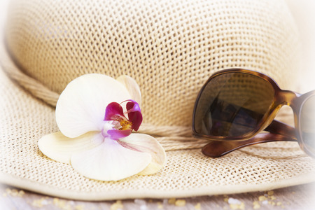 Summer vacation concept with straw hatの写真素材