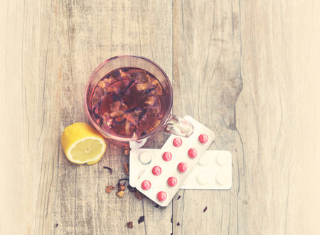 tea, lemon and pills cold treatmentの写真素材