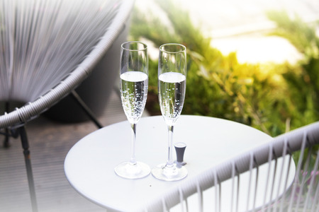Vintage champagne glasses background. New Year garden partyの写真素材