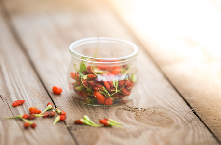 Goji fruits on wooden backgroundの写真素材