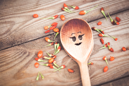 Goji fruits on wooden backgroundの写真素材