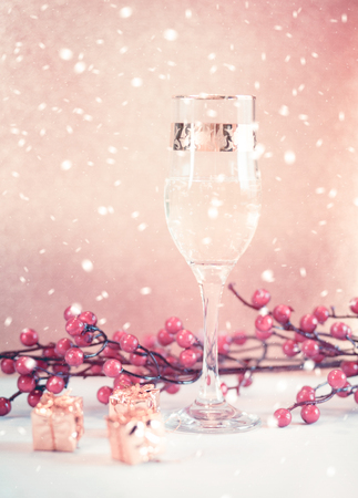 Winter background with New Year Champagne glassesの写真素材