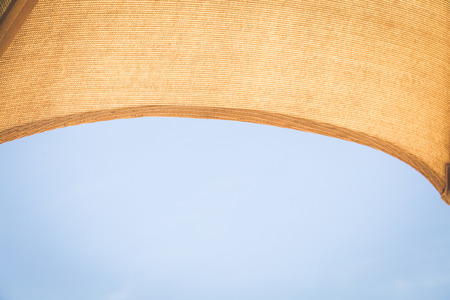 Abstract beach background with beach umbrellaの写真素材