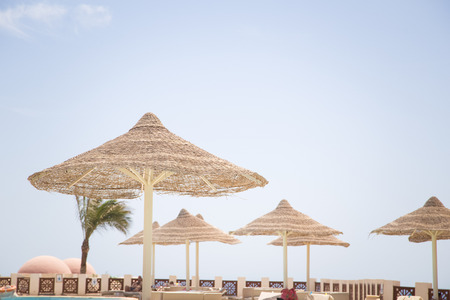 Beach umbrella relaxing summer vacationの写真素材