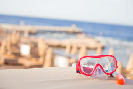 Snorkeling mask and tube on tropical beachの写真素材