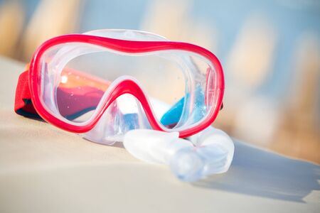 Snorkeling mask and tube on tropical beachの写真素材