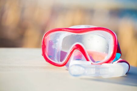 Snorkeling mask and tube on tropical beachの写真素材