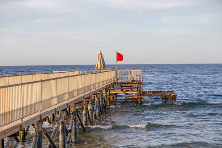 Red flag warning sign no swimming