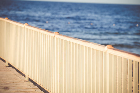 Wooden pier on the sea summer background